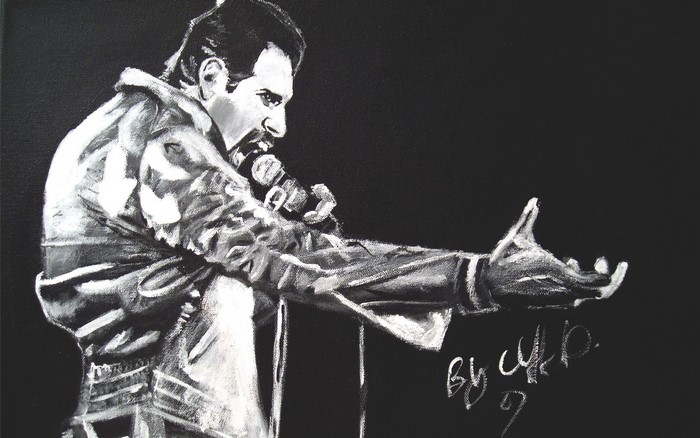 Freddie Mercury from Queen performing on stage