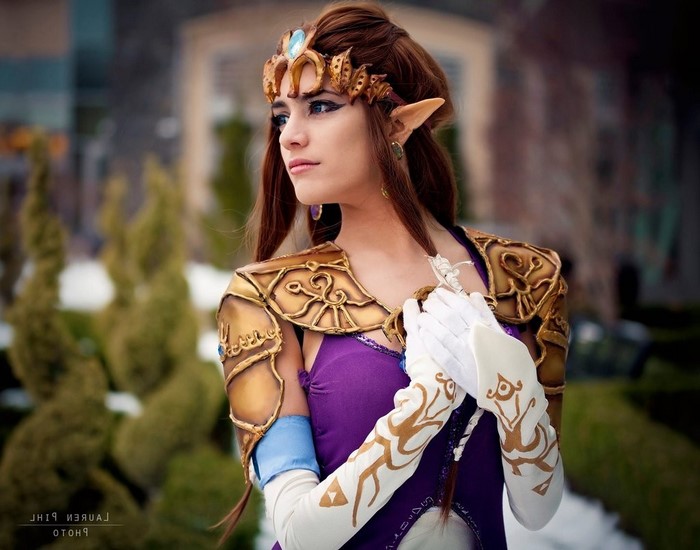 Princess Zelda cosplay with ornate armor and gloves