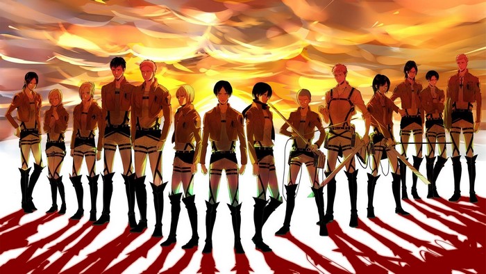 Attack on Titan characters standing against a sunset