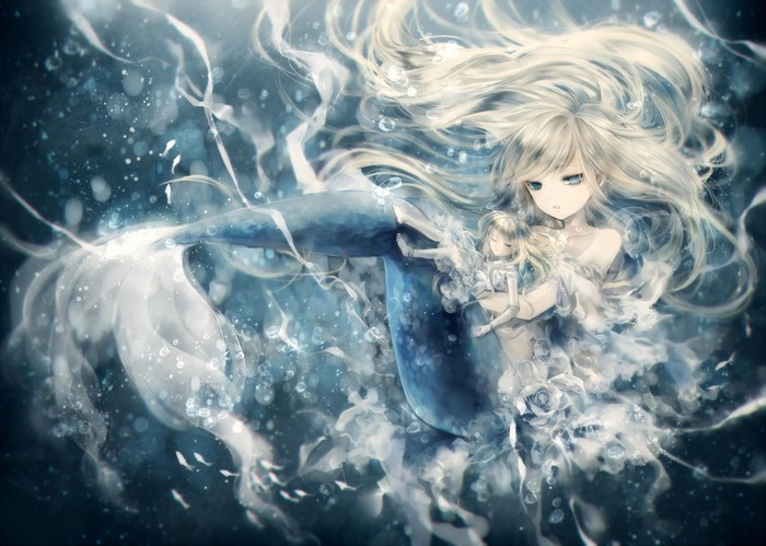Mermaid holding a doll underwater