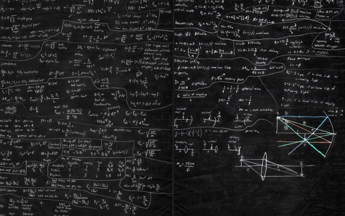 Physics and Mathematics Formulas on a Chalkboard