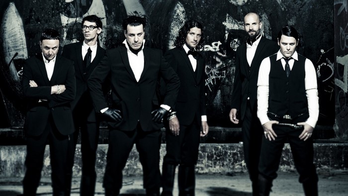 Rammstein band members in black suits