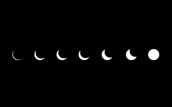Phases of the moon on a black background