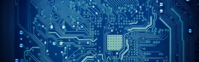 Close-up of a blue circuit board with many connections