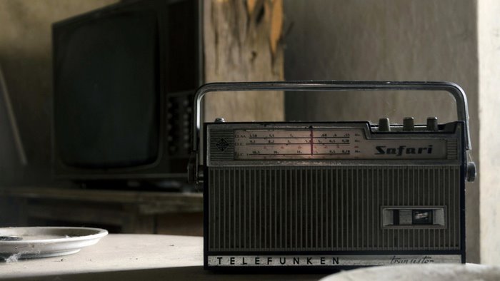 Vintage Telefunken Safari transistor radio and old TV