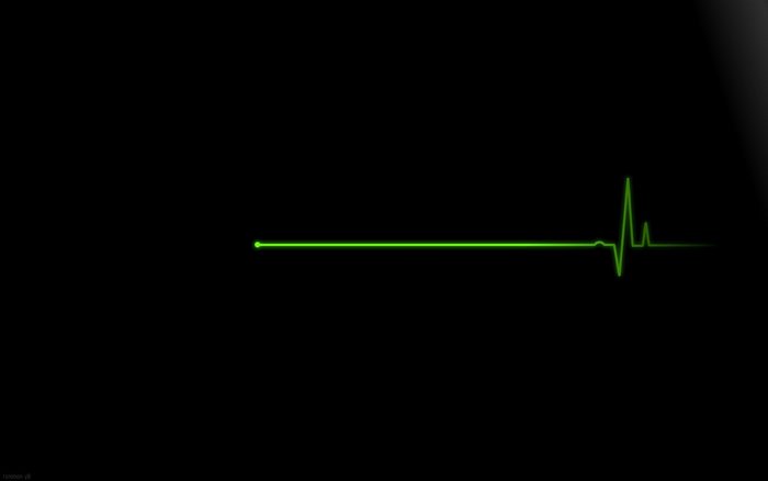 Green heartbeat line on black background
