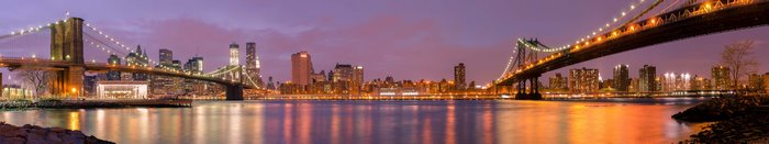 New York City skyline and bridges at night panorama