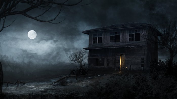 Haunted house under a full moon at night