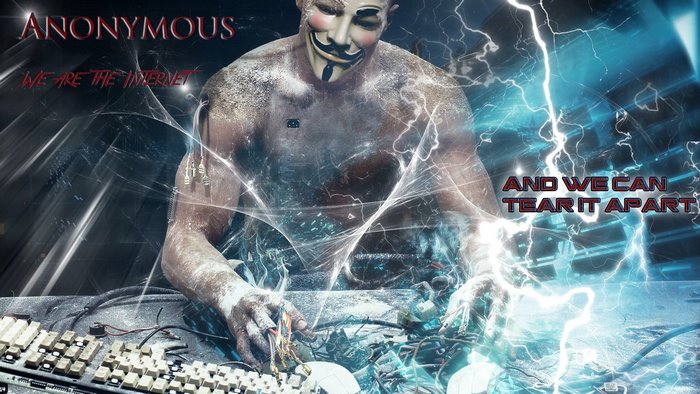 Anonymous hacker with Guy Fawkes mask and computer