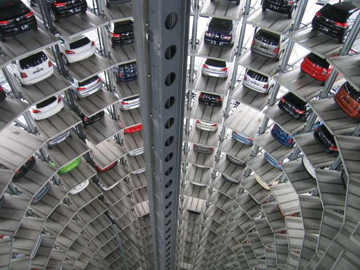 Automated multi-story car park with rows of parked cars