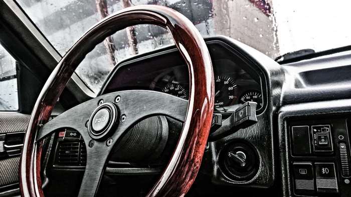 Audi car interior with wooden steering wheel