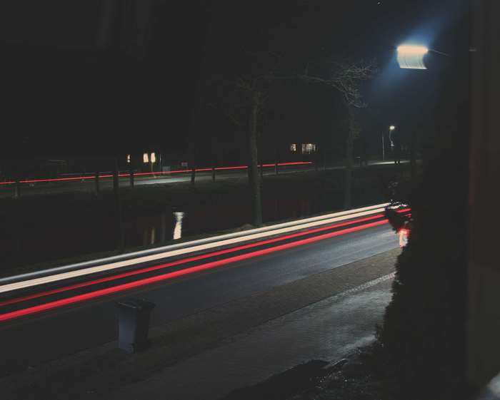 Light streaks on a road at night