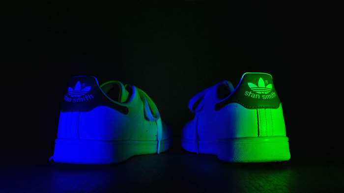 Adidas Stan Smiths with blue and green lighting