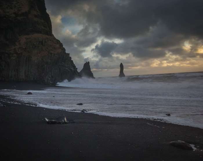 Black sand beach with rock formations in Iceland
