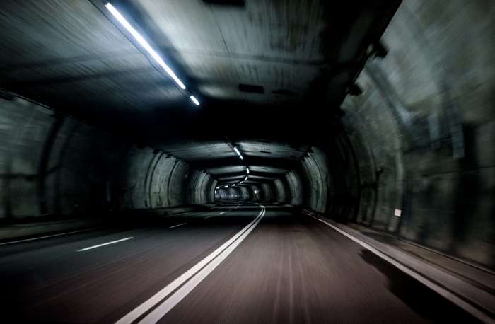 Dark Tunnel with Lights and Road