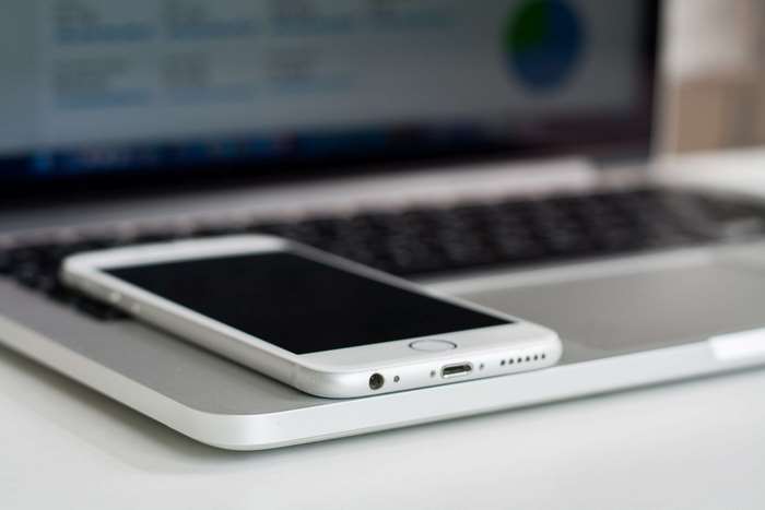 iPhone on a Laptop Keyboard