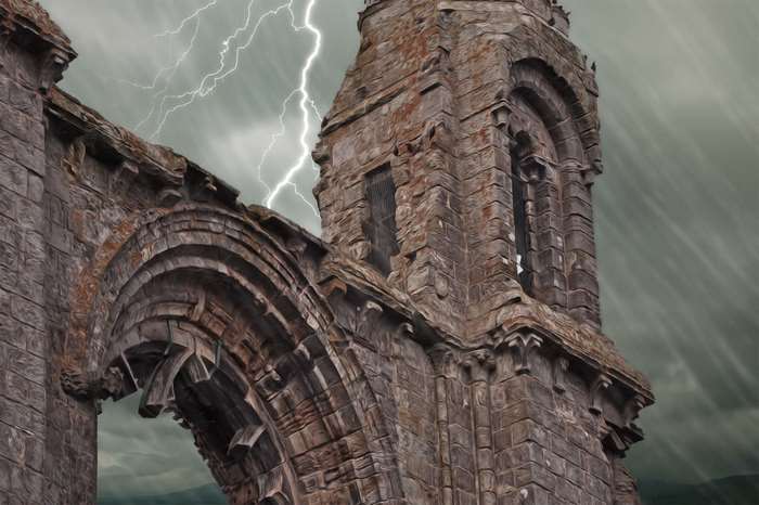 Ruined gothic architecture during a thunderstorm