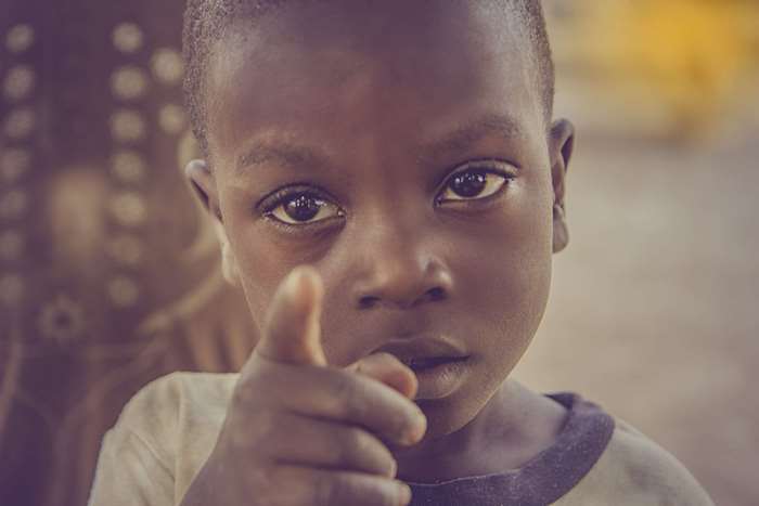 Young boy pointing in Nigeria 4K