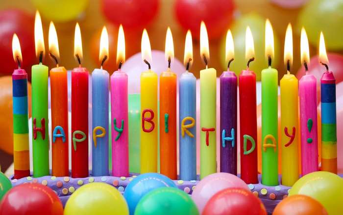Happy Birthday candles on a cake