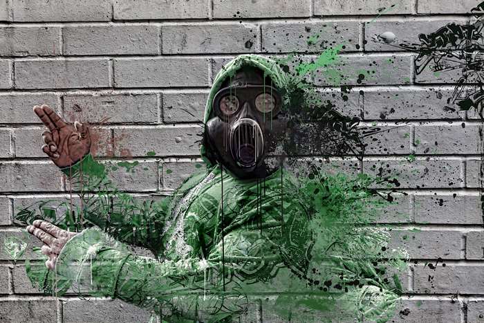 Person in Gas Mask with Green Splatter Graffiti