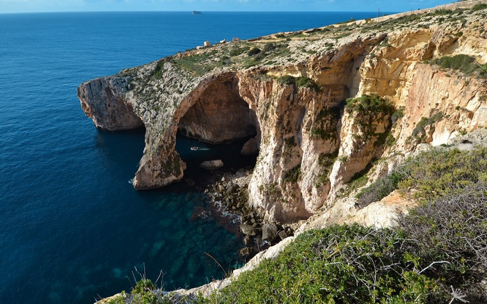 Natural arch over the sea