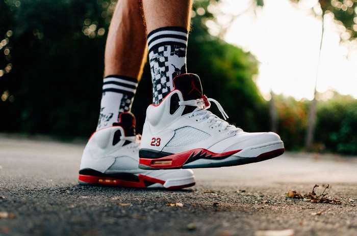 Air Jordan 5 Retro '23' sneakers on pavement