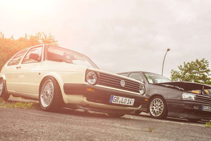 Two Volkswagen Golf Mk3 cars with custom tuning