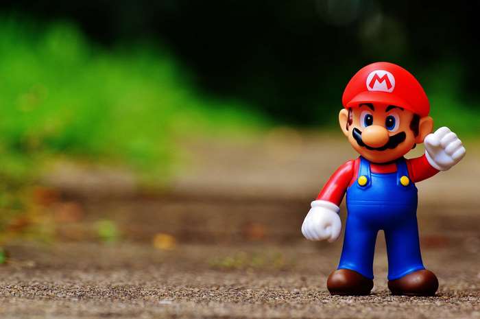 Super Mario Bros. toy figure on a path