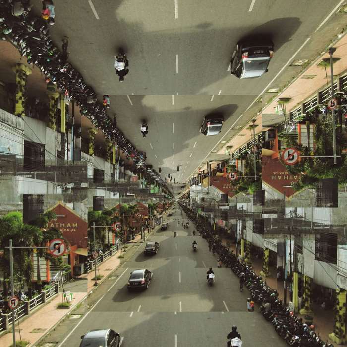 Inception-style urban street with inverted perspectives