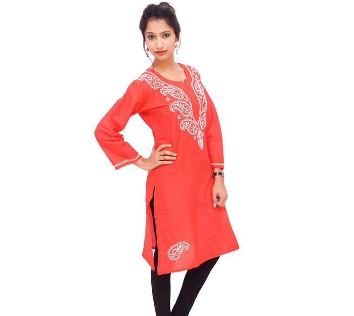 Woman in red embroidered kurta and black leggings