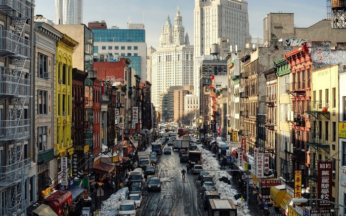 New York City street with skyscrapers and snow