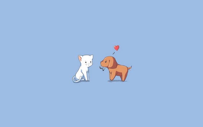 A white kitten and a brown puppy with a fish