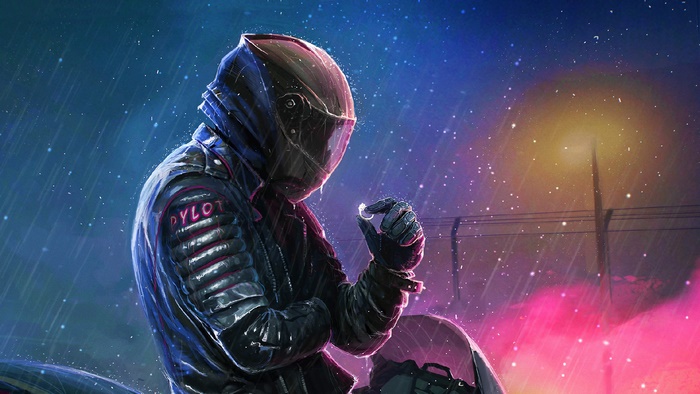 Biker in the rain holding a ring