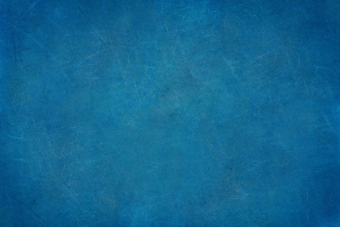Blue textured abstract background with scratches