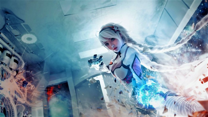 Cosplayer in futuristic white and purple outfit holding a gun