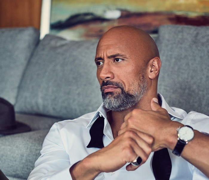 Dwayne Johnson wearing a white shirt and black bowtie