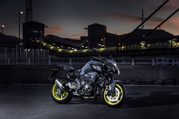 Yamaha motorcycle parked at industrial site at dusk