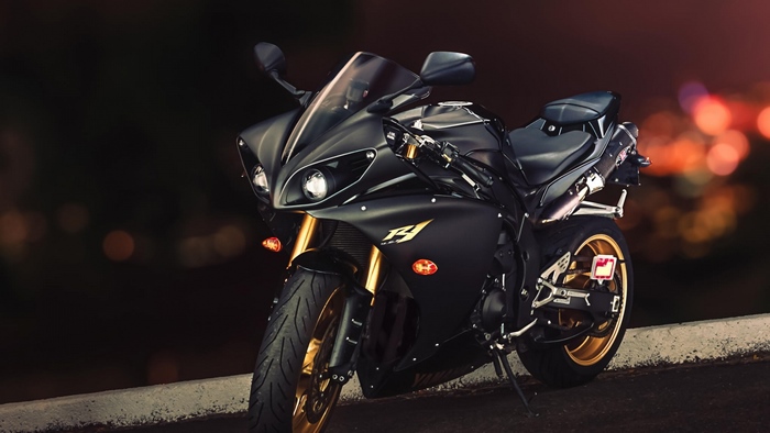 Black Yamaha R1 motorcycle with gold accents