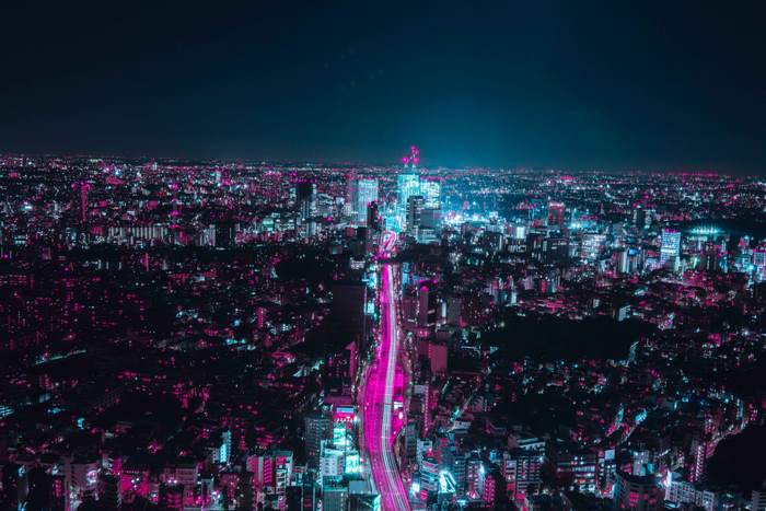 Aerial view of a neon city at night in Japan