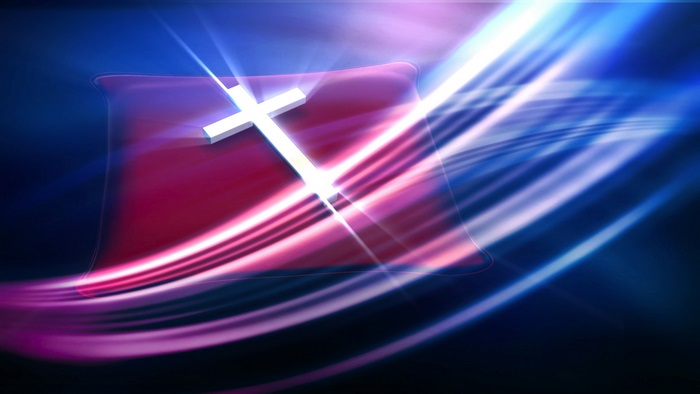 White cross on a red pillow with abstract light streaks