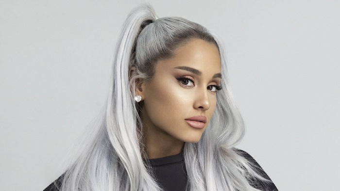 Ariana Grande with white hair and heart earrings