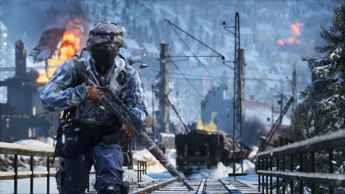 Soldier with sniper rifle in snowy battlefield
