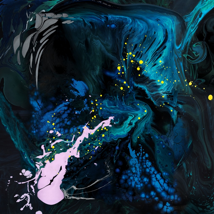 Colorful paint splash on dark background