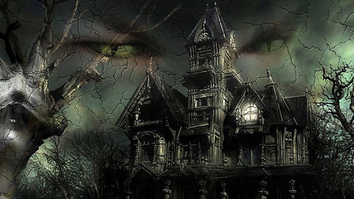 Haunted house with spooky trees and eye in the sky