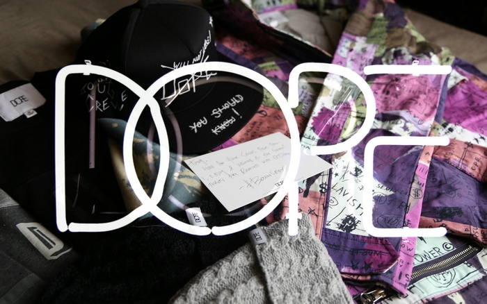 DOPE clothing items and a note