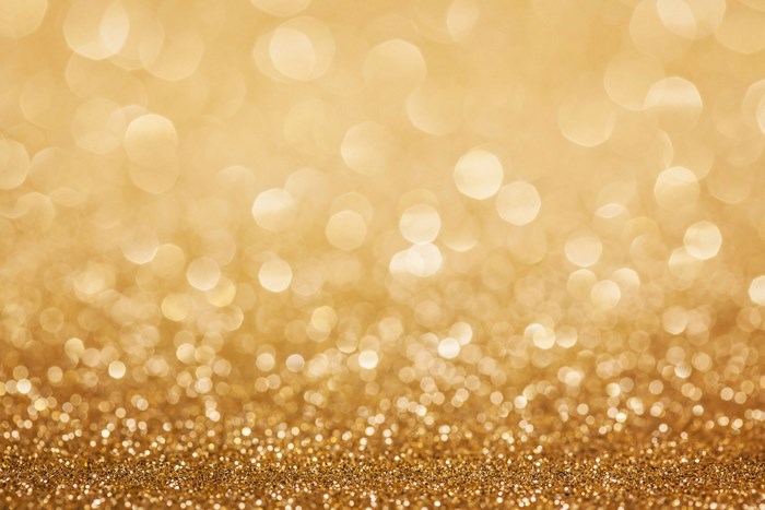 Golden glitter bokeh background