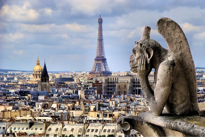 Gargoyle overlooking Paris with Eiffel Tower