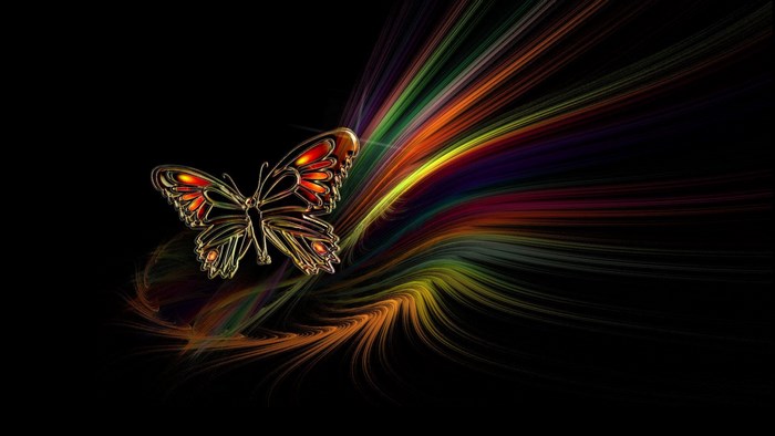 Golden butterfly with colorful light streaks