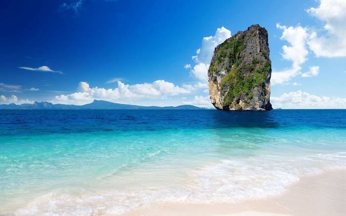 Tropical island rock formation in the ocean