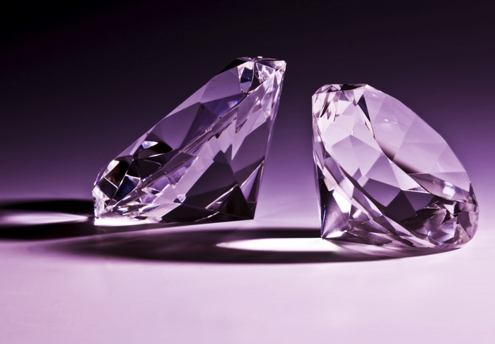 Two diamonds on a purple background